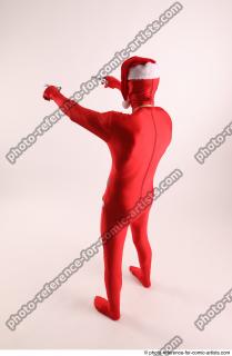 JOEL_ADAMSON CHRISTMAS VILLAIN WITH TWO GUNS